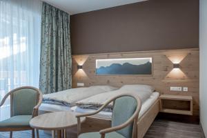 Letto o letti in una camera di Hotel Mathiesn