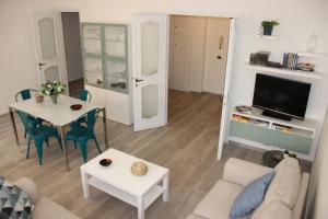 Et opholdsområde på Appartamento Via dei Fabbri Navali