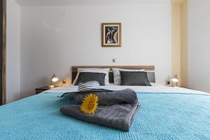 Un pat sau paturi într-o cameră la Apartment Carmen
