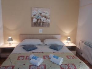 Postel nebo postele na pokoji v ubytování Apartments Jasna