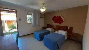 Katil atau katil-katil dalam bilik di Palmier Hotel & Convenções +27 gambar