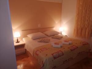 Postel nebo postele na pokoji v ubytování Apartments Jasna