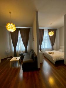 Posteľ alebo postele v izbe v ubytovaní Ametyst Apartments