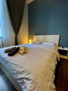 Posteľ alebo postele v izbe v ubytovaní Ametyst Apartments