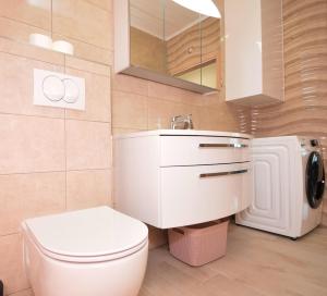 Koupelna v ubytování VILLA APARTMENTS FILIP + 37 fotografií