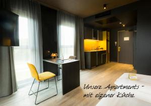 Kuchyň nebo kuchyňský kout v ubytování MY HOME MY HOTEL Rosenheim