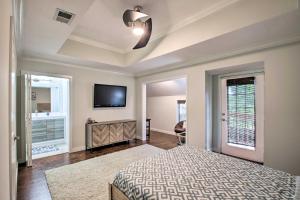 A bed or beds in a room at 2-Story Pensacola Home with Game Room and Private Yard