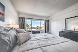 a bedroom with a large bed and a window at Modern City Condo Close to Downtown Phoenix! in Phoenix +16 photos