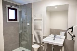 Kúpeľňa v ubytovaní Hotel Mogay