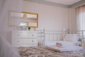A bed or beds in a room at Deruni Ilıca