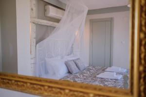 A bed or beds in a room at Deruni Ilıca