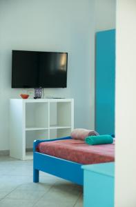 TV a/nebo společenská místnost v ubytování PortoAgali