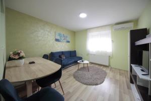 TV a/nebo společenská místnost v ubytování Apartman DIAMOND-LUX