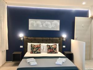 Letto o letti in una camera di Sunset rooms
