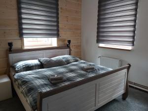 Posteľ alebo postele v izbe v ubytovaní Svatý Jakub