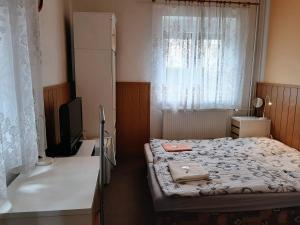 Posteľ alebo postele v izbe v ubytovaní Penzion Bezděkov