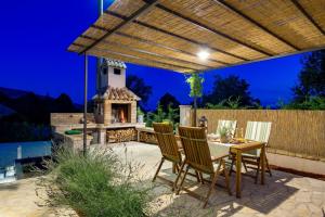Patio nebo venkovní prostory v ubytování Villa Aurania