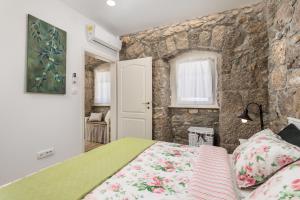 Postel nebo postele na pokoji v ubytování Villa Aurania