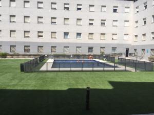 The swimming pool at or close to Apartamentos Apartour Bormujos