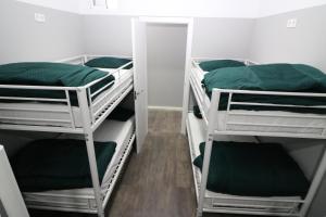 A bed or beds in a room at Madrid Downtown Hostel