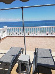 A balcony or terrace at Sea Side Villa Economou