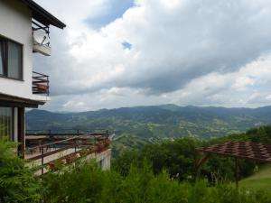 a view of the mountains from a house at Karadzhovata Kashta in Zlatograd