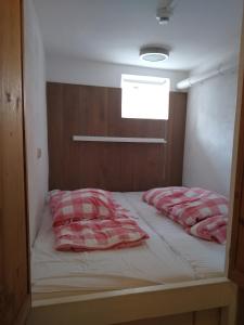 Postel nebo postele na pokoji v ubytování Appartement Haarlem Gosau
