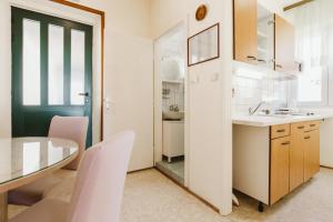 Kuchyň nebo kuchyňský kout v ubytování Apartment Kuzmanić + 19 fotografií