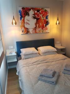 Postel nebo postele na pokoji v ubytování Apartament Tarnovianka - Centrum