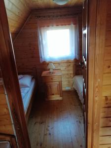 Posteľ alebo postele v izbe v ubytovaní PILGRIM domek gościnny w Gietrzwałdzie na Warmii + 34 fotografií