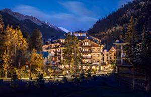 a hotel in the mountains at night at The Blake at Taos Ski Valley in Taos Ski Valley