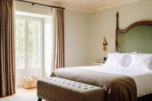 Cama ou camas em um quarto em Quinta Nova Winery House - Relais & Châteaux
