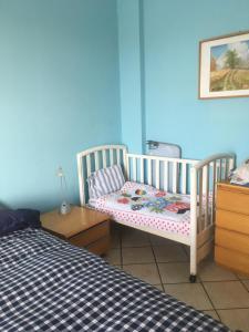 A bed or beds in a room at Vacanze a Finale Ligure