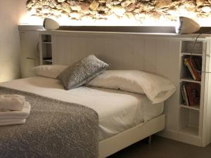 Postel nebo postele na pokoji v ubytování Can Clotas Hotel Masia