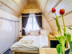 Posteľ alebo postele v izbe v ubytovaní Machajówka + 37 fotografií