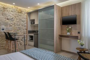 Kuchyň nebo kuchyňský kout v ubytování Casa D'Irene Deluxe Hotel