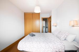 Postel nebo postele na pokoji v ubytování Modern Apartment with Spacious Terrace