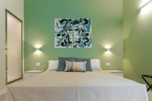 Posteľ alebo postele v izbe v ubytovaní Donna Isa B&B