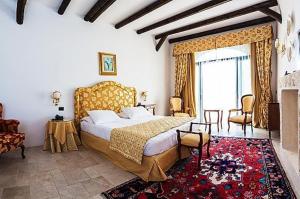 Cama o camas de una habitación en Masseria Relais Del Cardinale