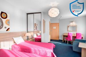 Posteľ alebo postele v izbe v ubytovaní Hotel Petrus