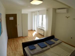 Postel nebo postele na pokoji v ubytování Holiday Apartment Lavanda Sumpetar