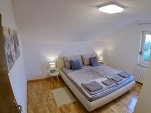Postel nebo postele na pokoji v ubytování Holiday Apartment Lavanda Sumpetar