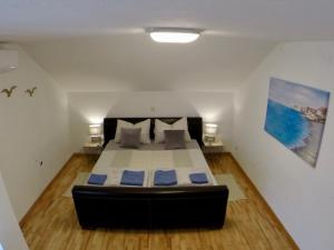 Postel nebo postele na pokoji v ubytování Holiday Apartment Lavanda Sumpetar