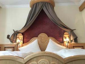 Postel nebo postele na pokoji v ubytování Hotel Neuwirt