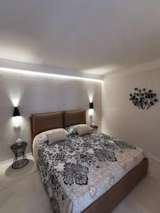 Кровать или кровати в номере Via Vittorio Emanuele Apartment