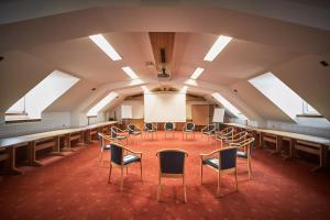 a room with a table and chairs in it at Hotel Donauhof in Emmersdorf an der Donau
