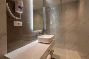 Koupelna v ubytování Hotel Sunce Neum