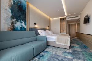 Postel nebo postele na pokoji v ubytování Hotel Sunce Neum