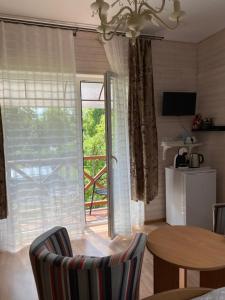 Kuchyň nebo kuchyňský kout v ubytování Green Gile Villa in Druskininkai Center