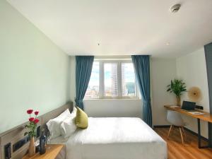 Voodi või voodid majutusasutuse Yunfan Hotel toas